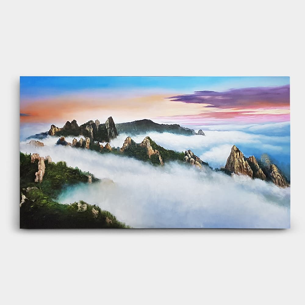 Mountain Peaks Above the Sea of Clouds